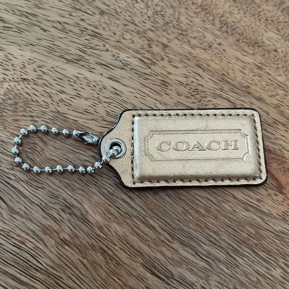 Coach Gold leather Hang Tag